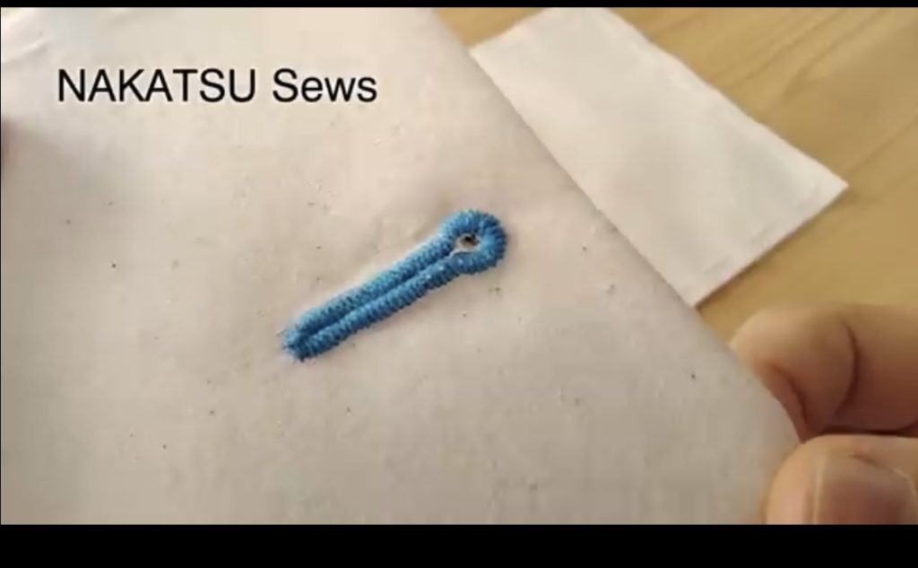 ハトメ付き穴かがり